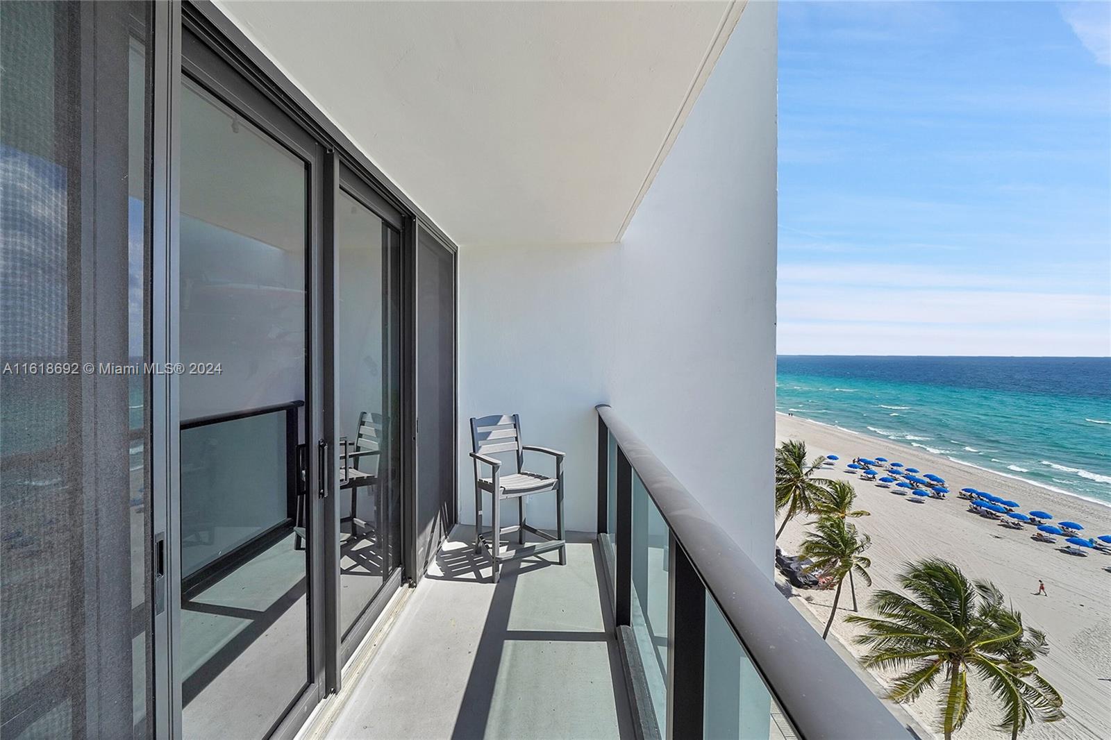 a balcony with view of ocean