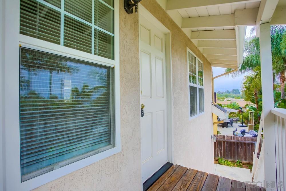 a view of balcony with furniture