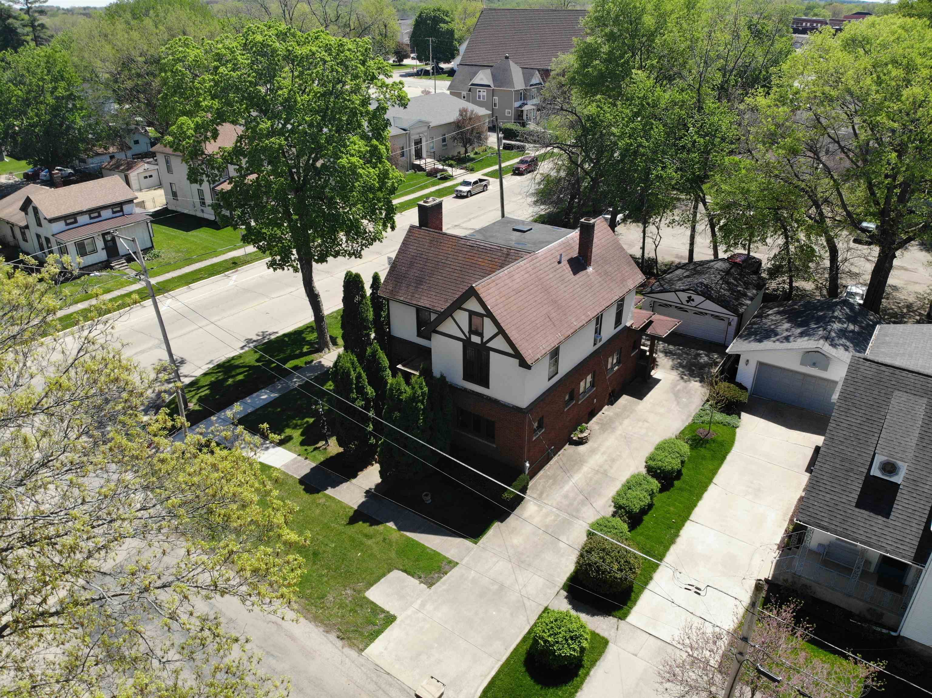 an aerial view of a house with a garden view