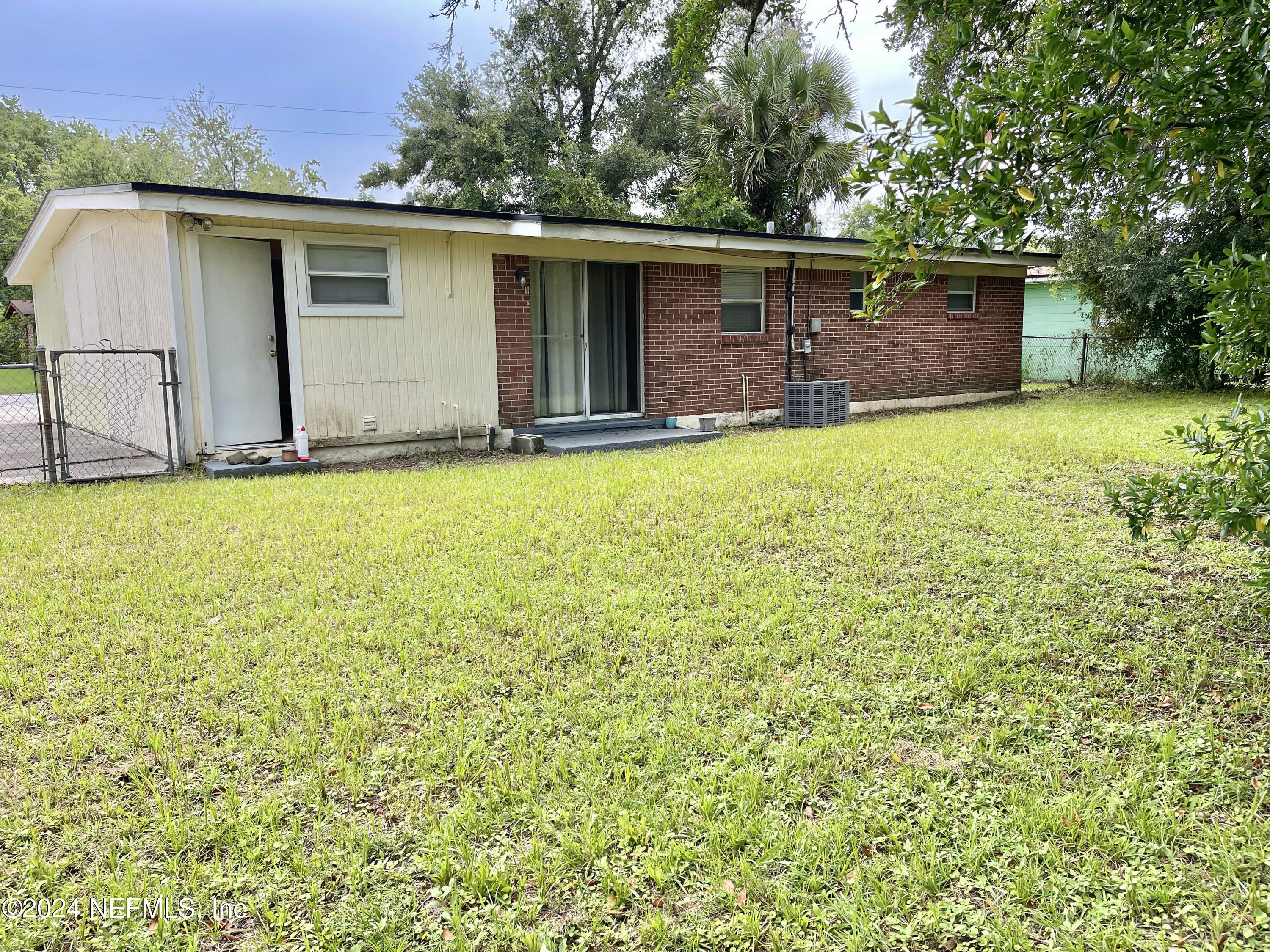 a front view of a house with yard