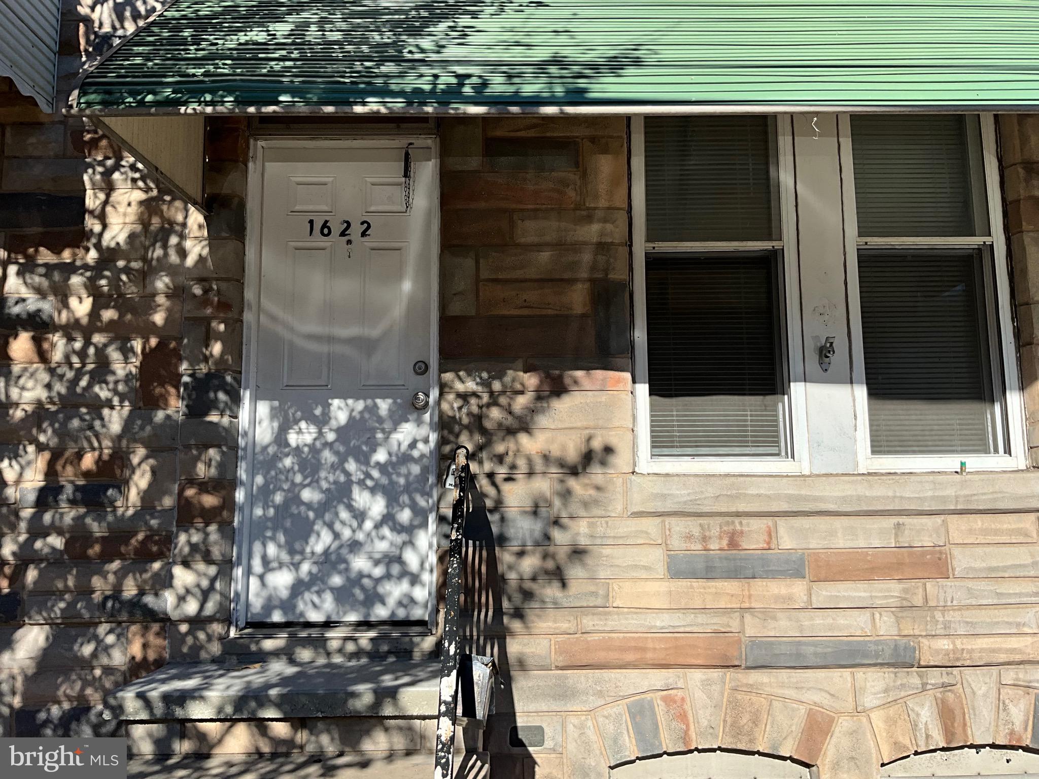 a view of door front of house