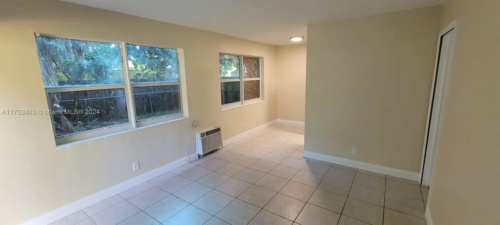 a view of hallway with windows