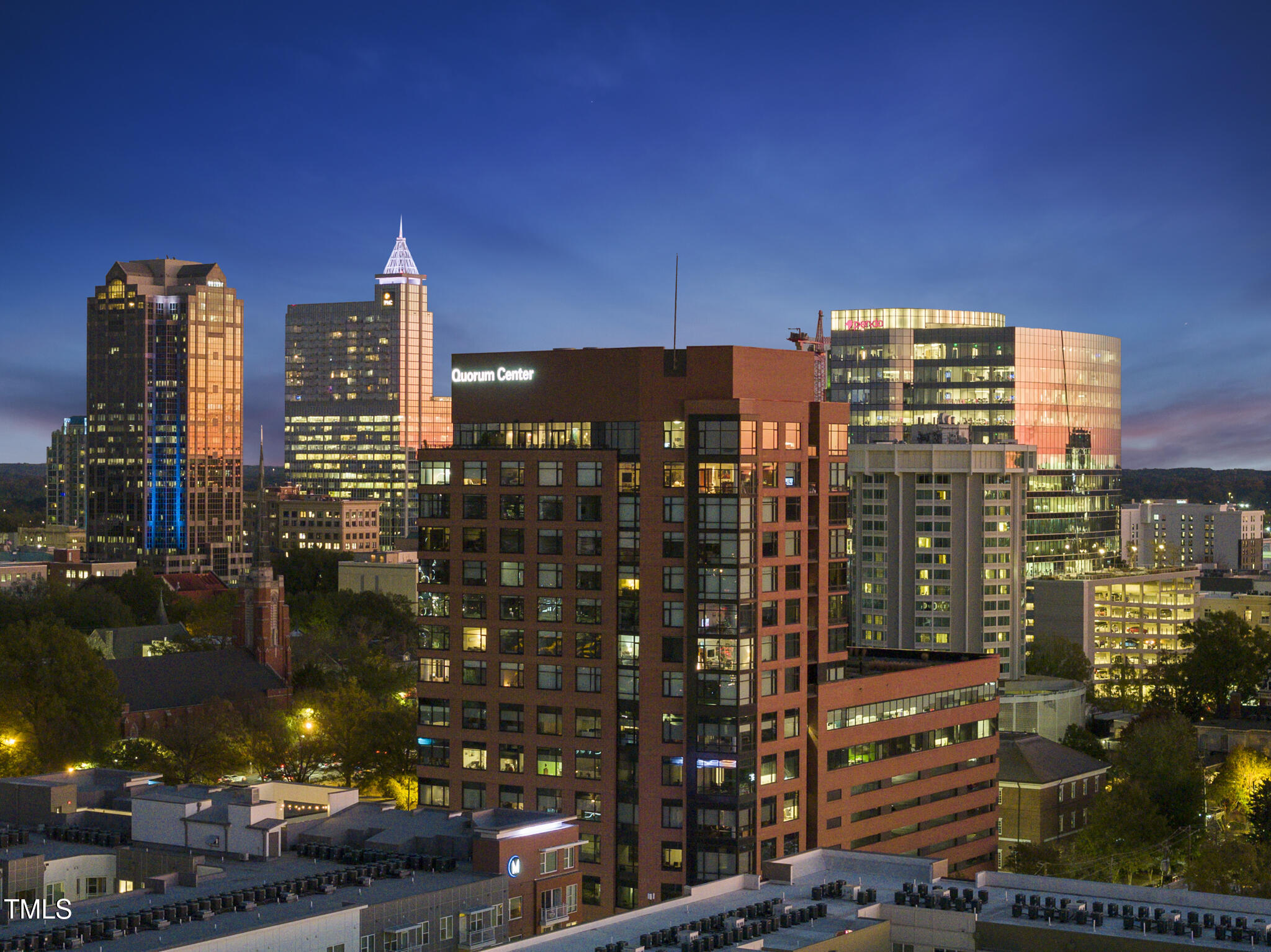 a view of a city with tall buildings