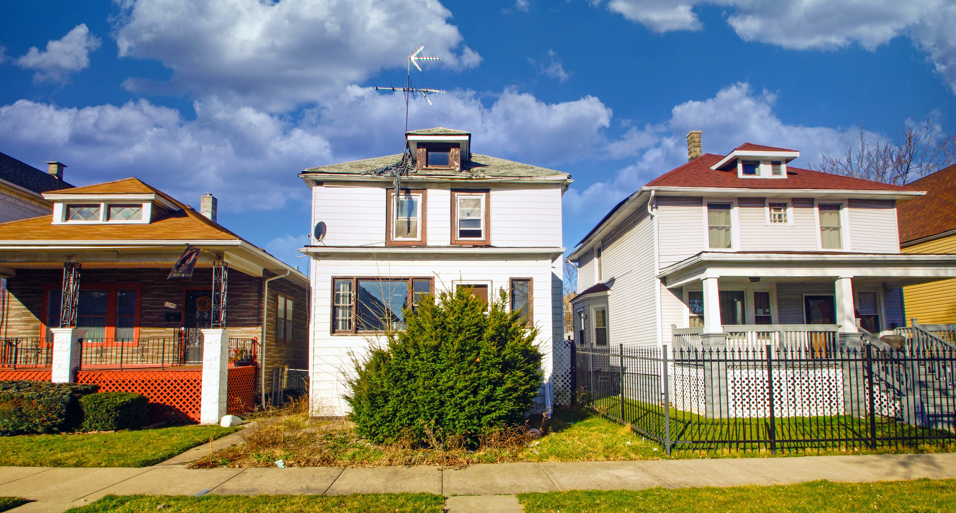 front view of a house with a yard