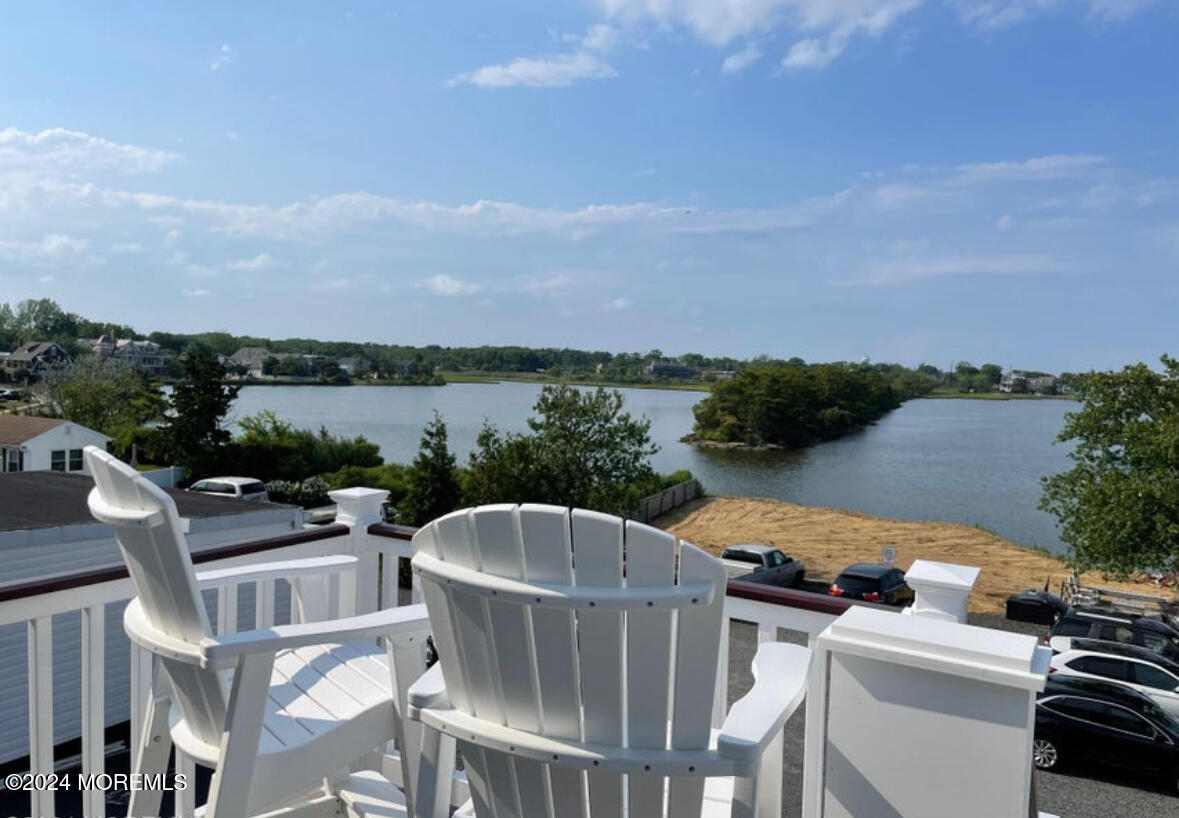 a view of a chairs and table on the terrace