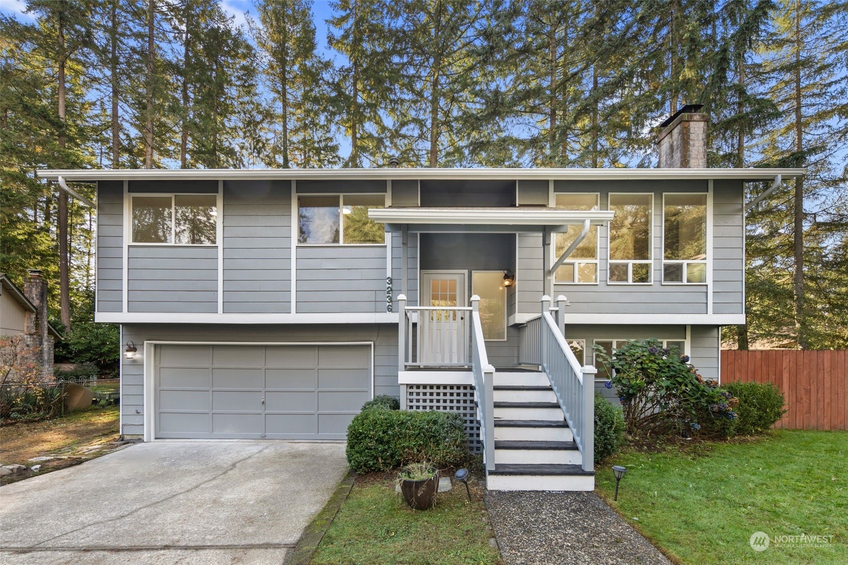 front view of a house with a yard