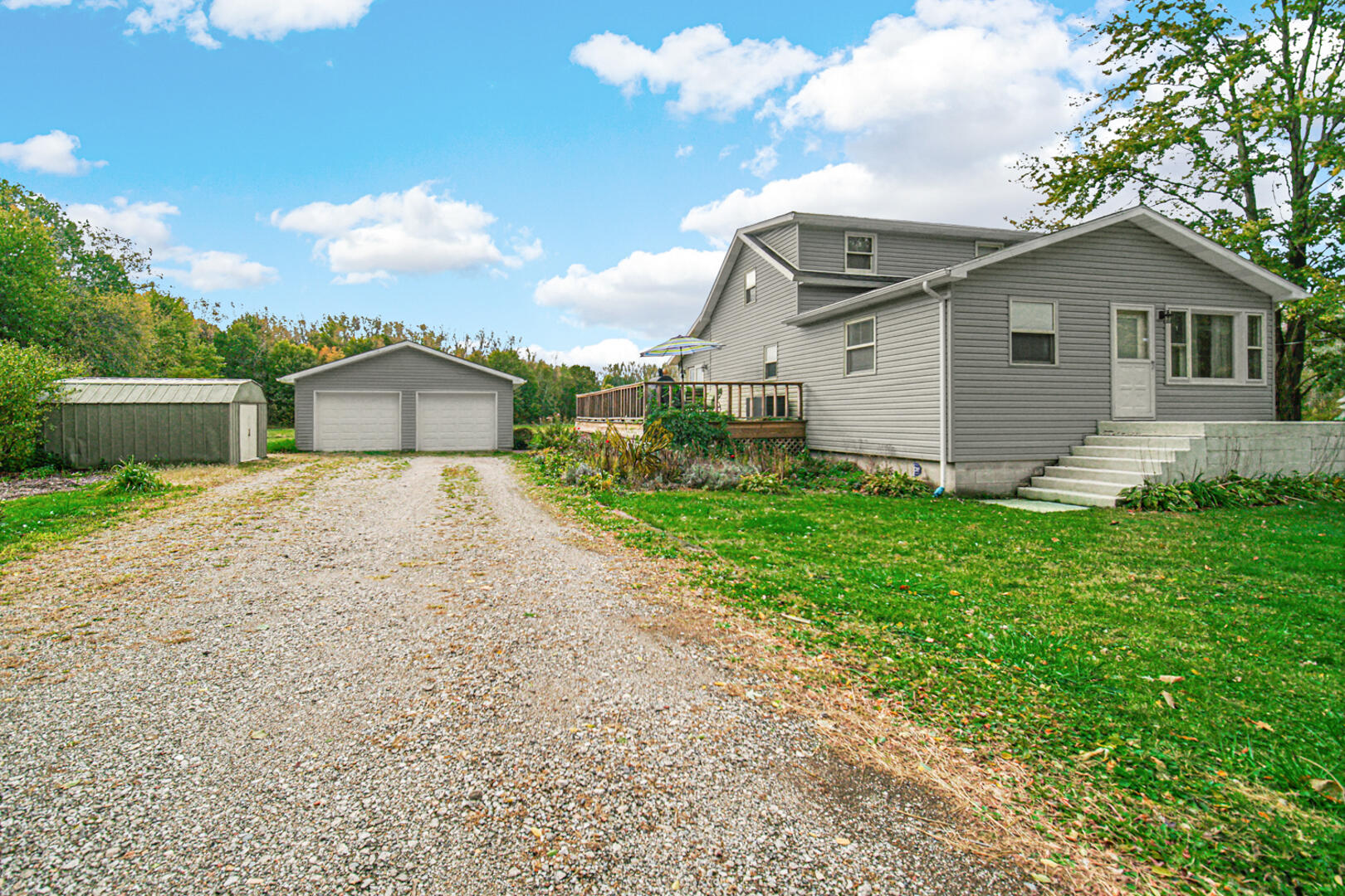 a front view of house with yard and seating area