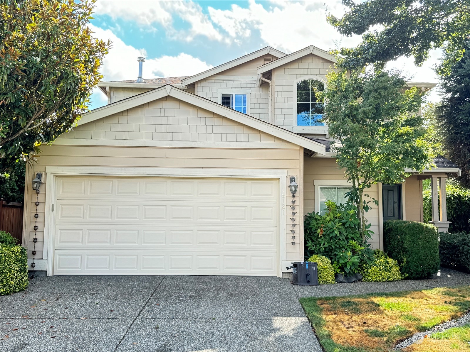 a view of house with garage