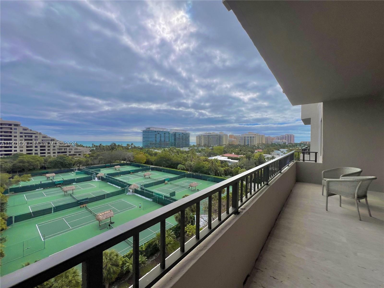 a view of a balcony with city view