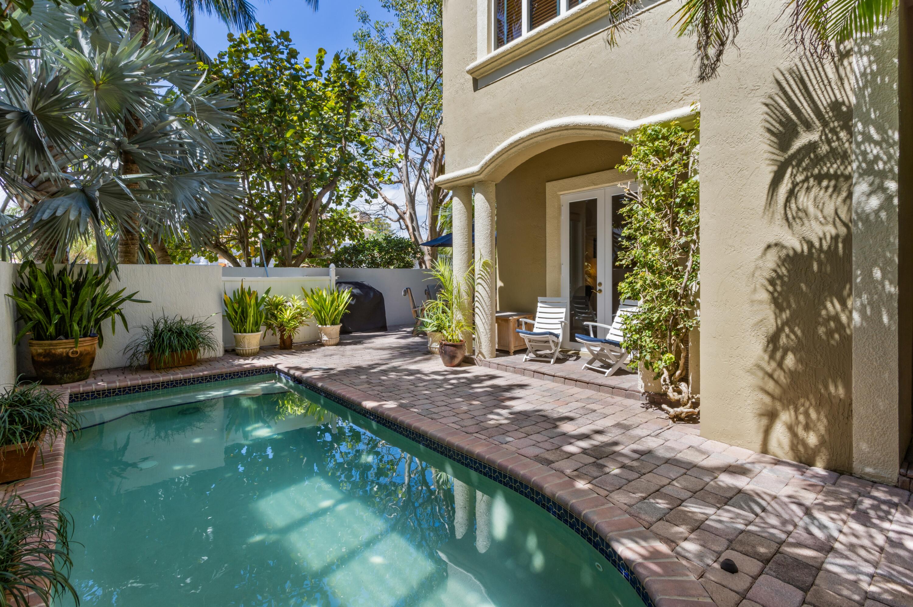 a view of a house with a swimming pool