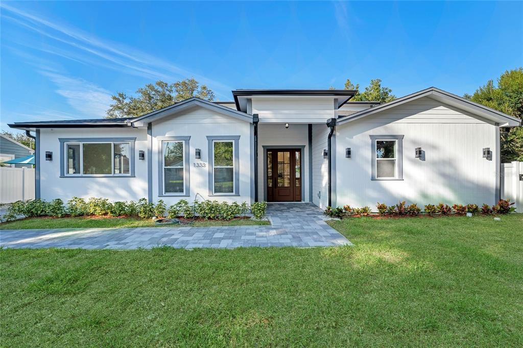 front view of a house with a yard