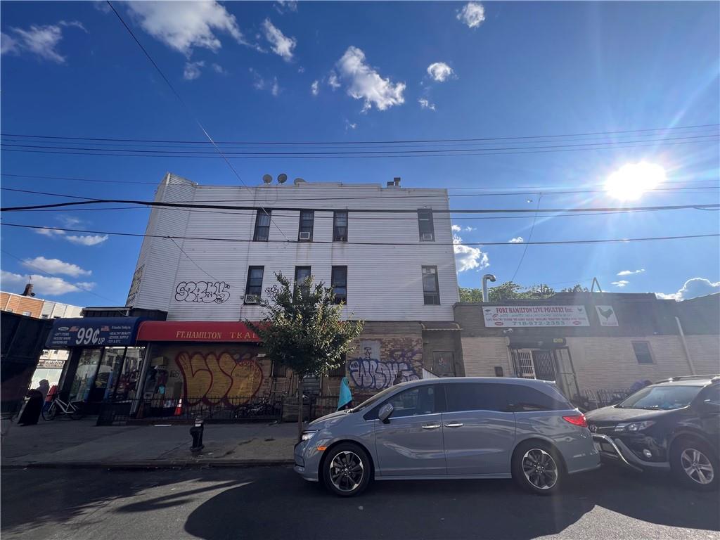 a car parked in front of a building