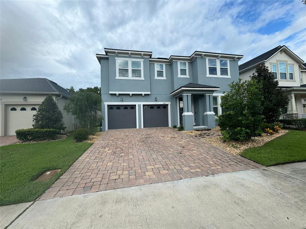 front view of a house with a yard