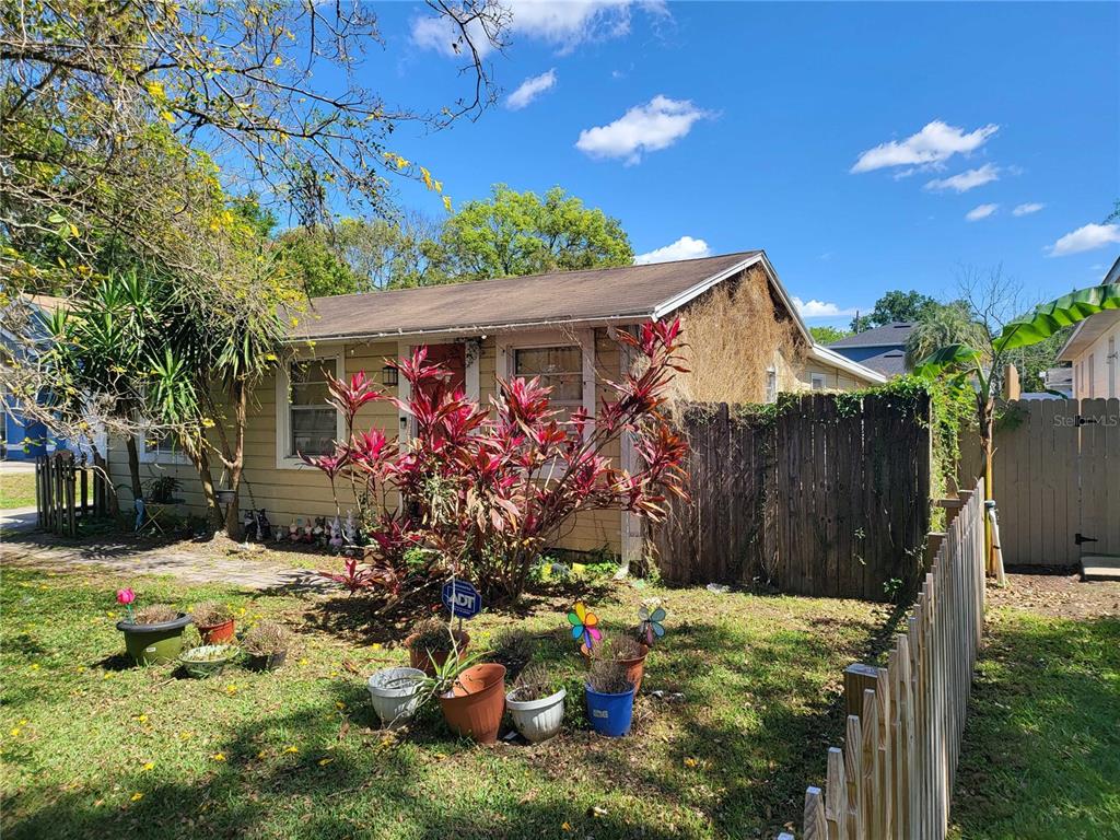 a view of a backyard with a patio