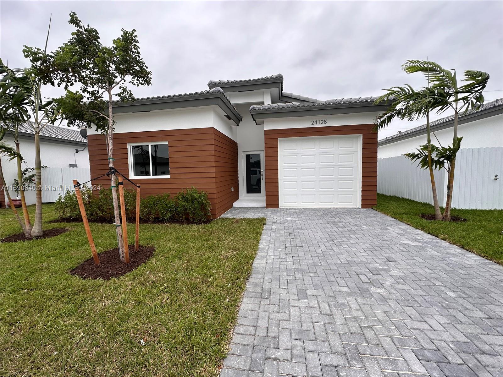 a front view of house with yard