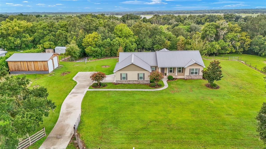 Custom built home on 2 parcels totaling 10.48 acres