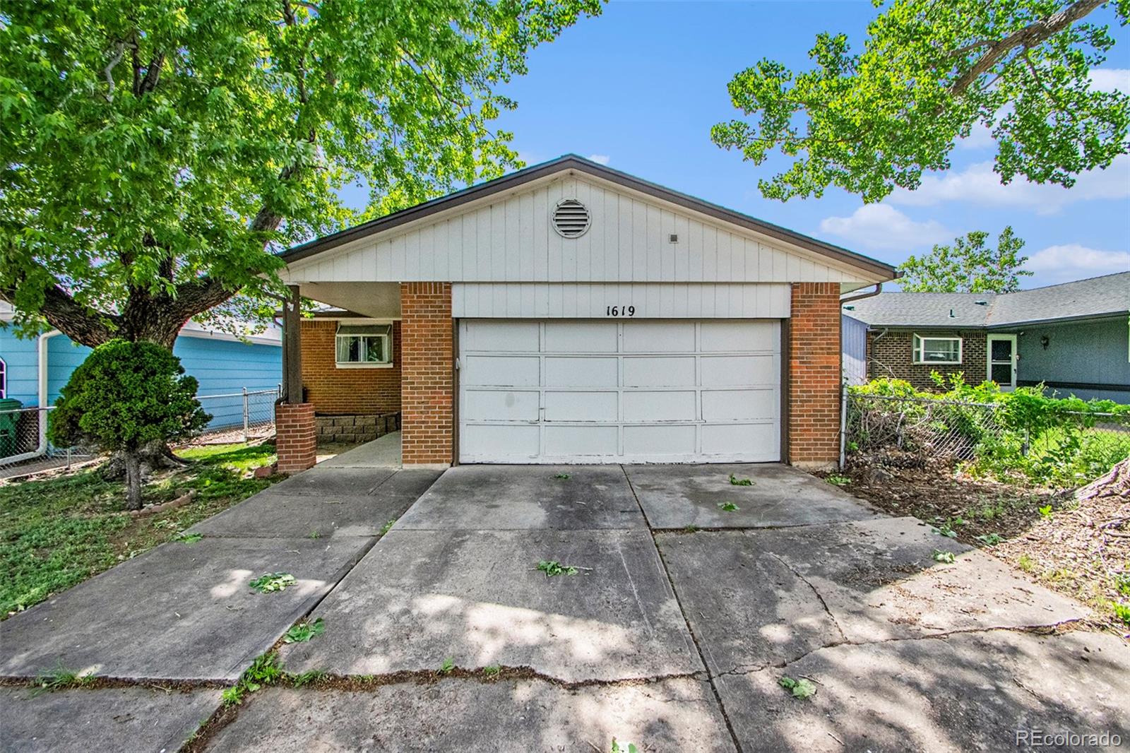 a front view of house with a garage