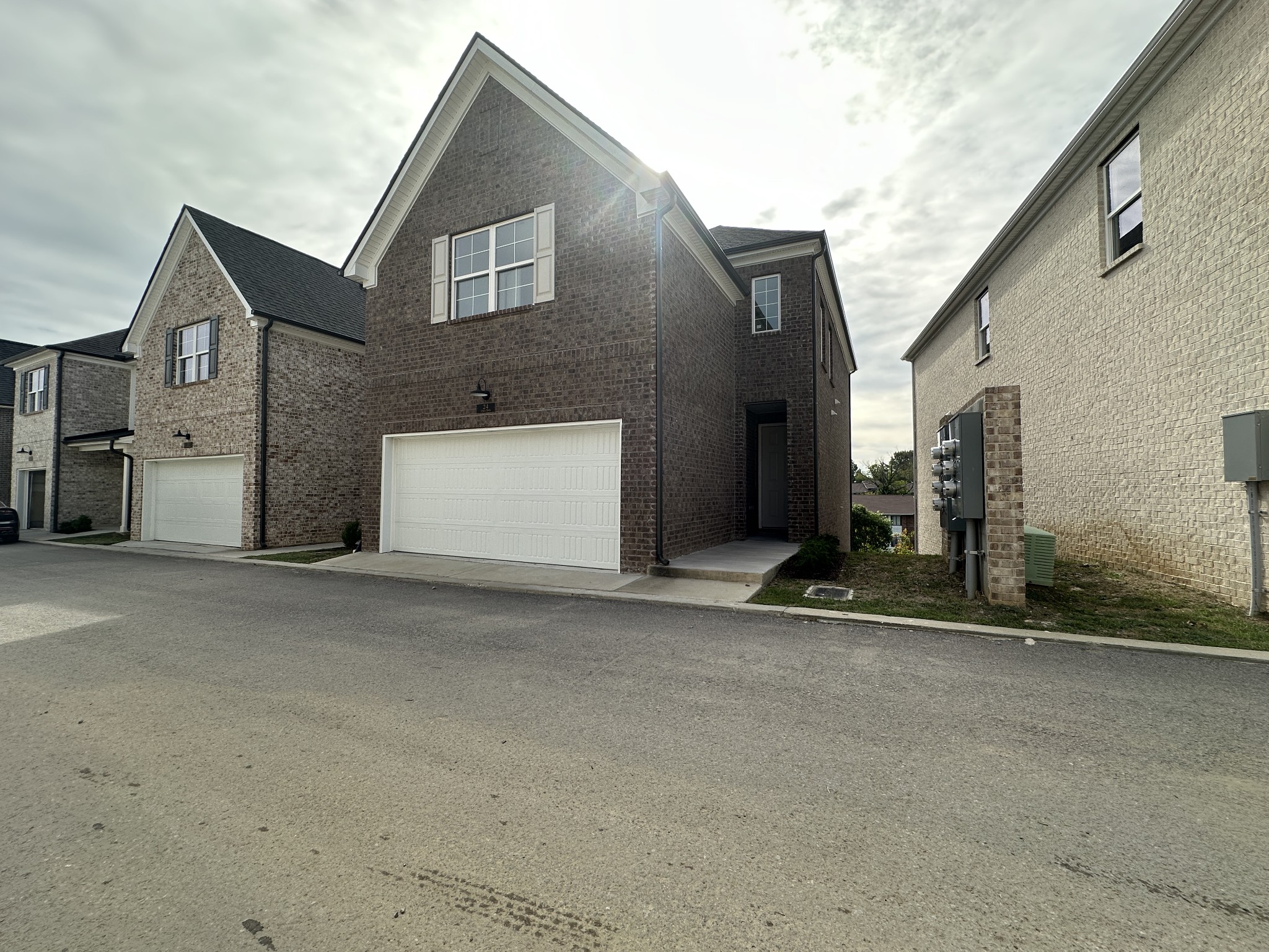 a front view of a house with a garage