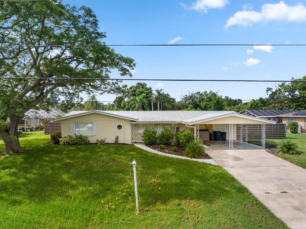 front view of a house with a yard