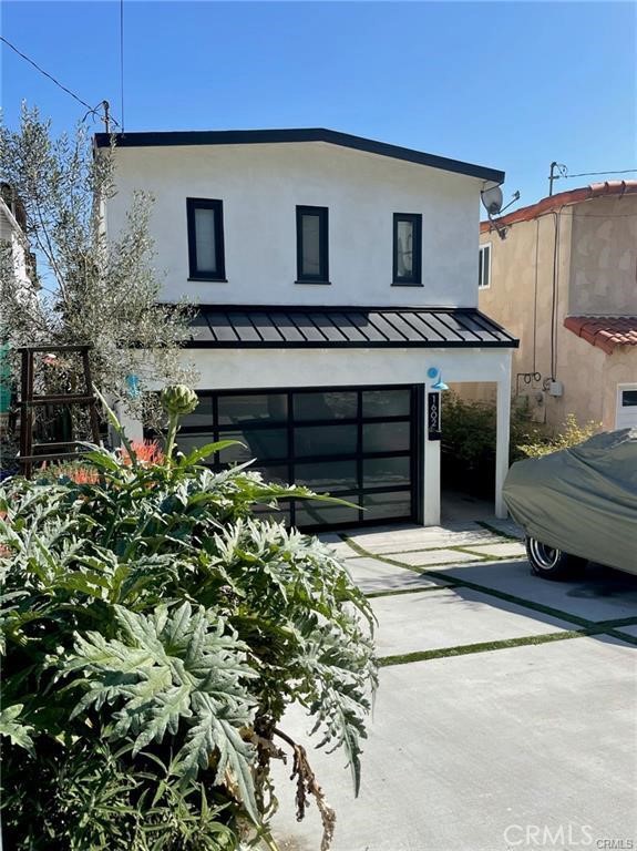 a view of a house with a garage