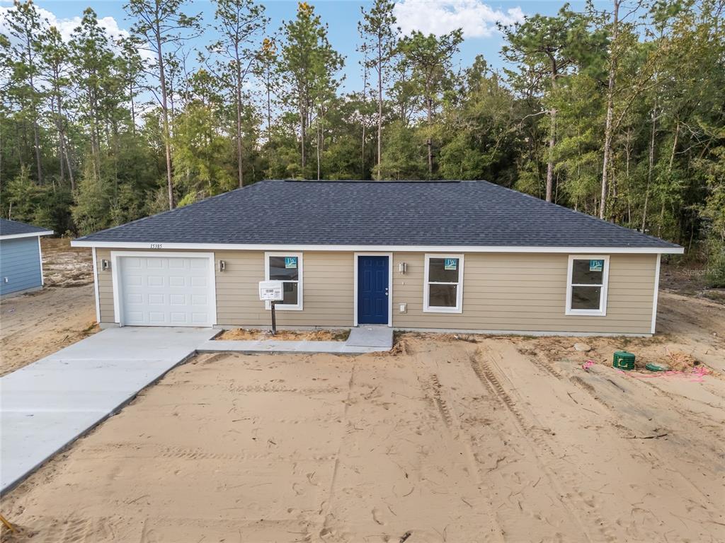 a house with trees in the background