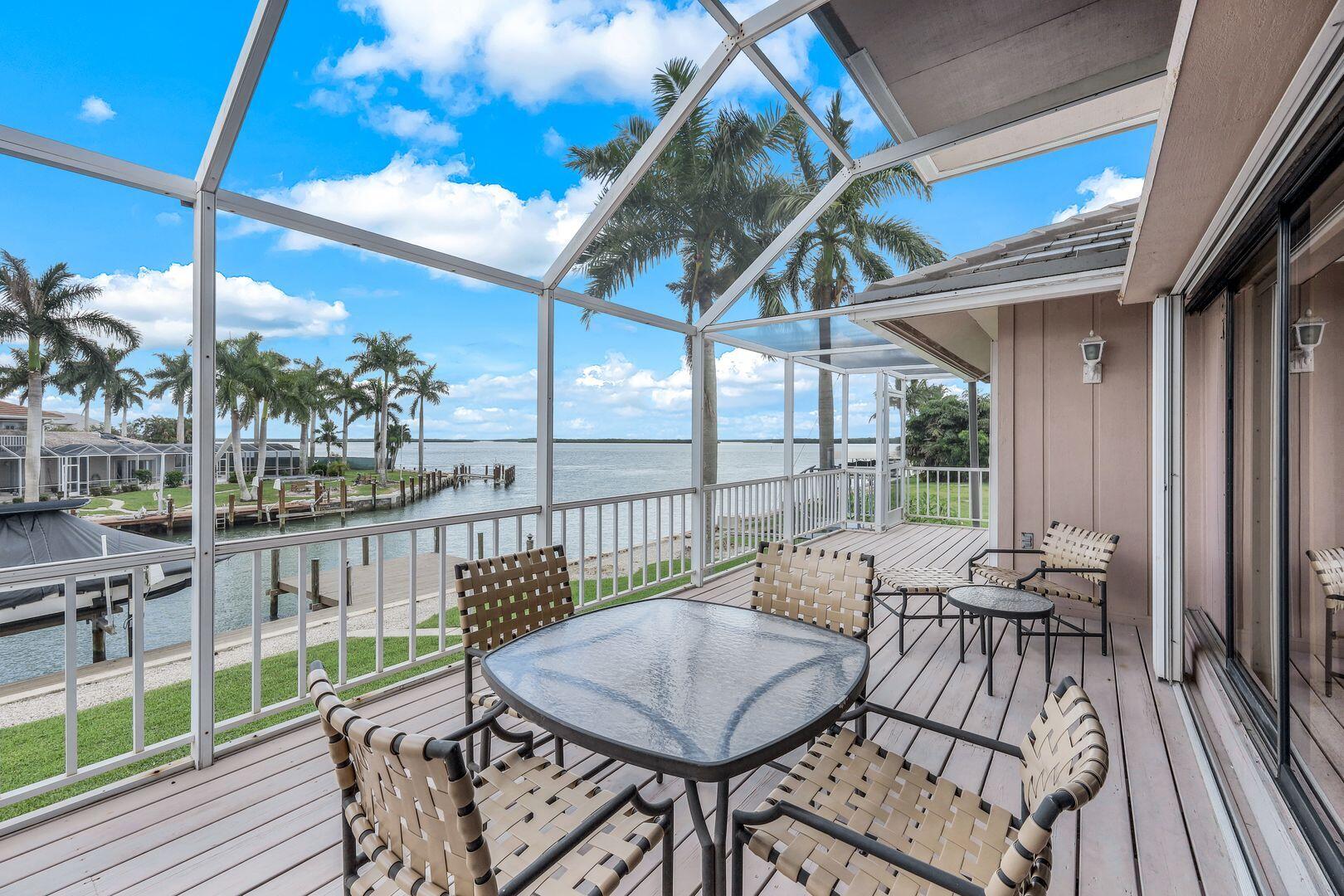 a view of a balcony with furniture