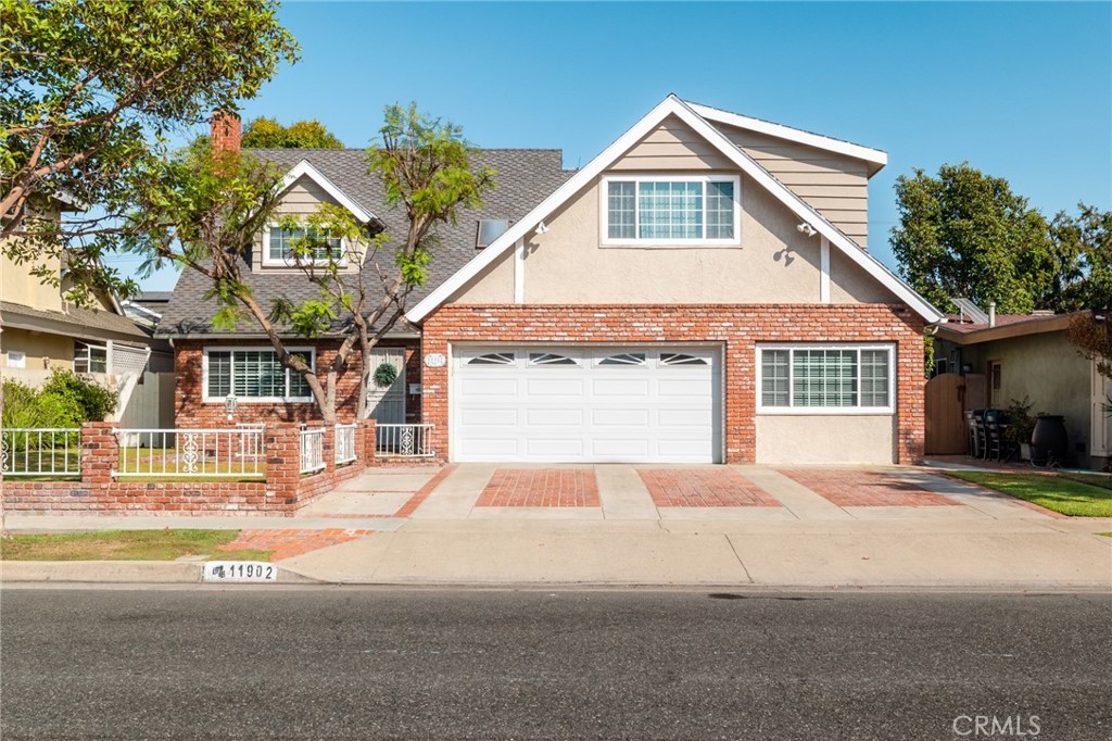 a front view of a house with a garage