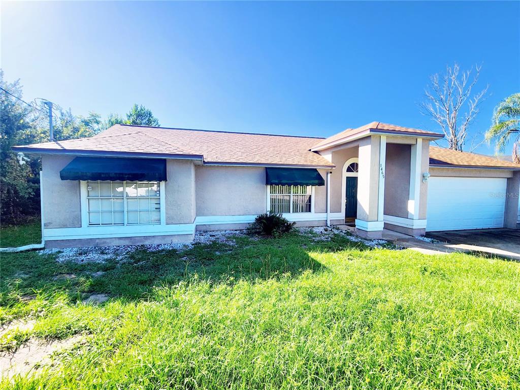 3-bed, 2-Bath Deltona Home sits on nearly 1/2 acre!