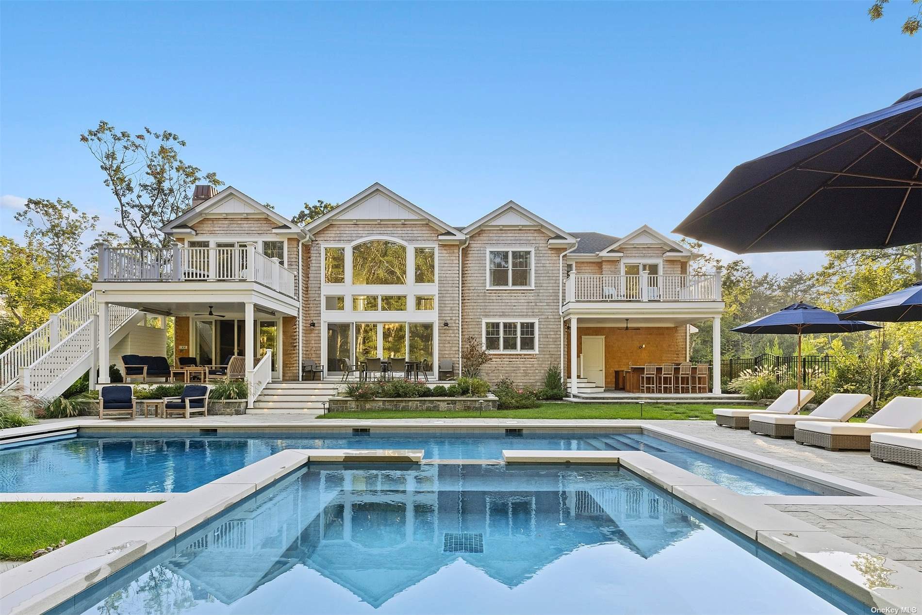 a view of a swimming pool with a lounge chairs