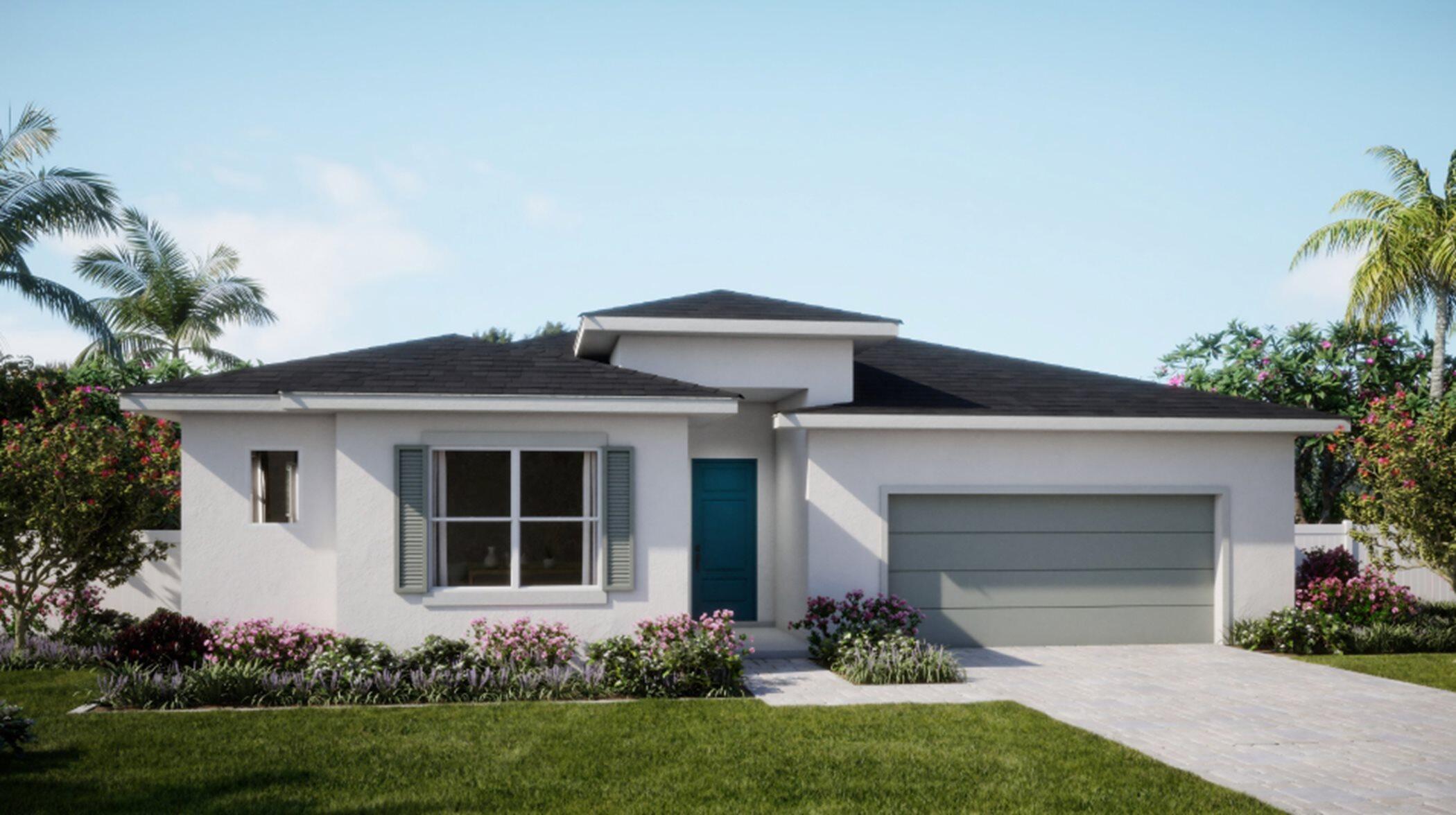 a front view of a house with a garden and garage