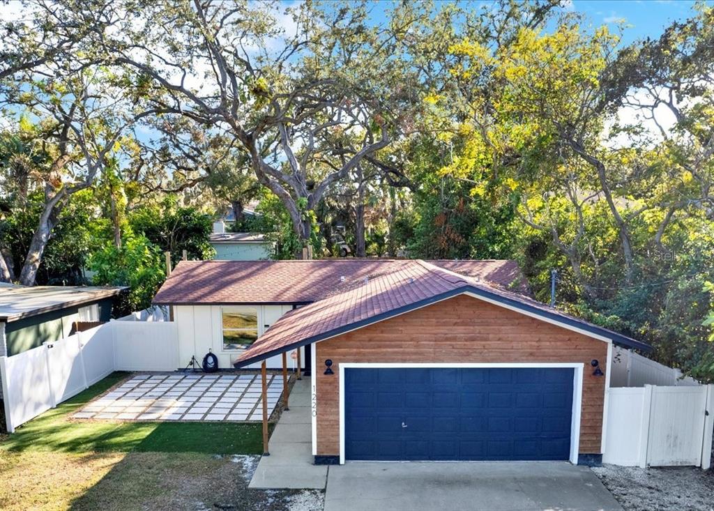 a house with trees in the background