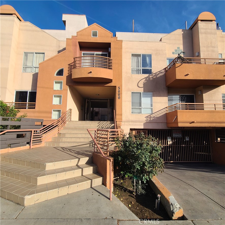 a front view of a house with parking