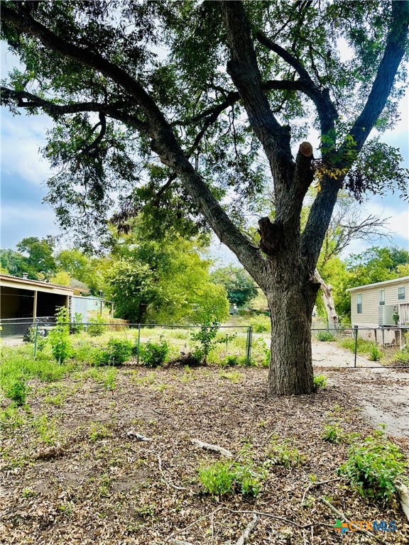 a view of outdoor space and yard