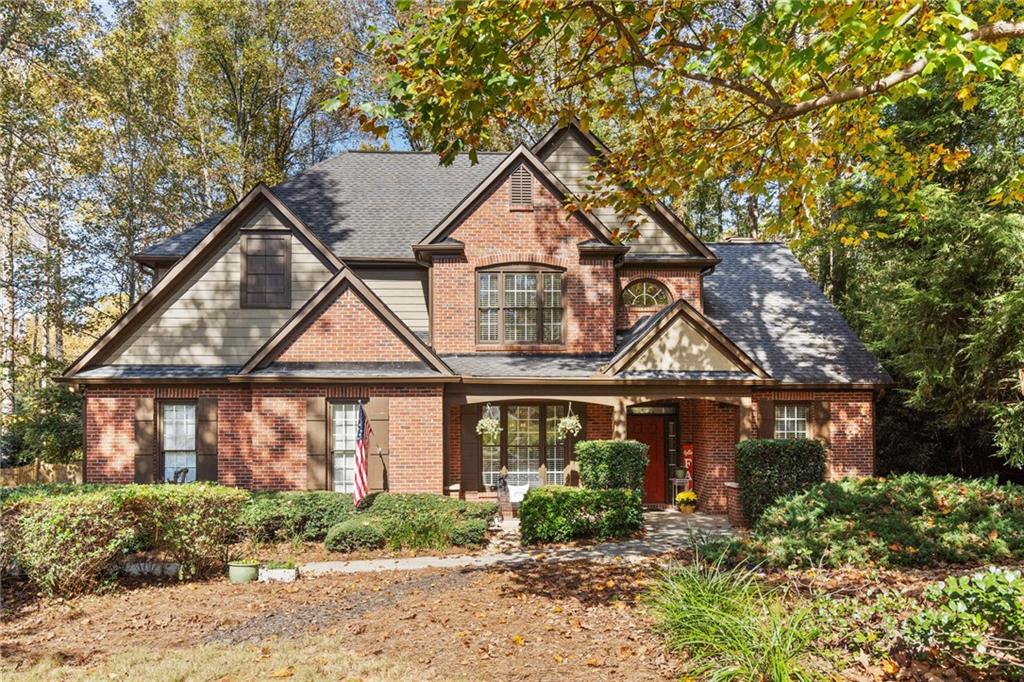 front view of a house with a yard