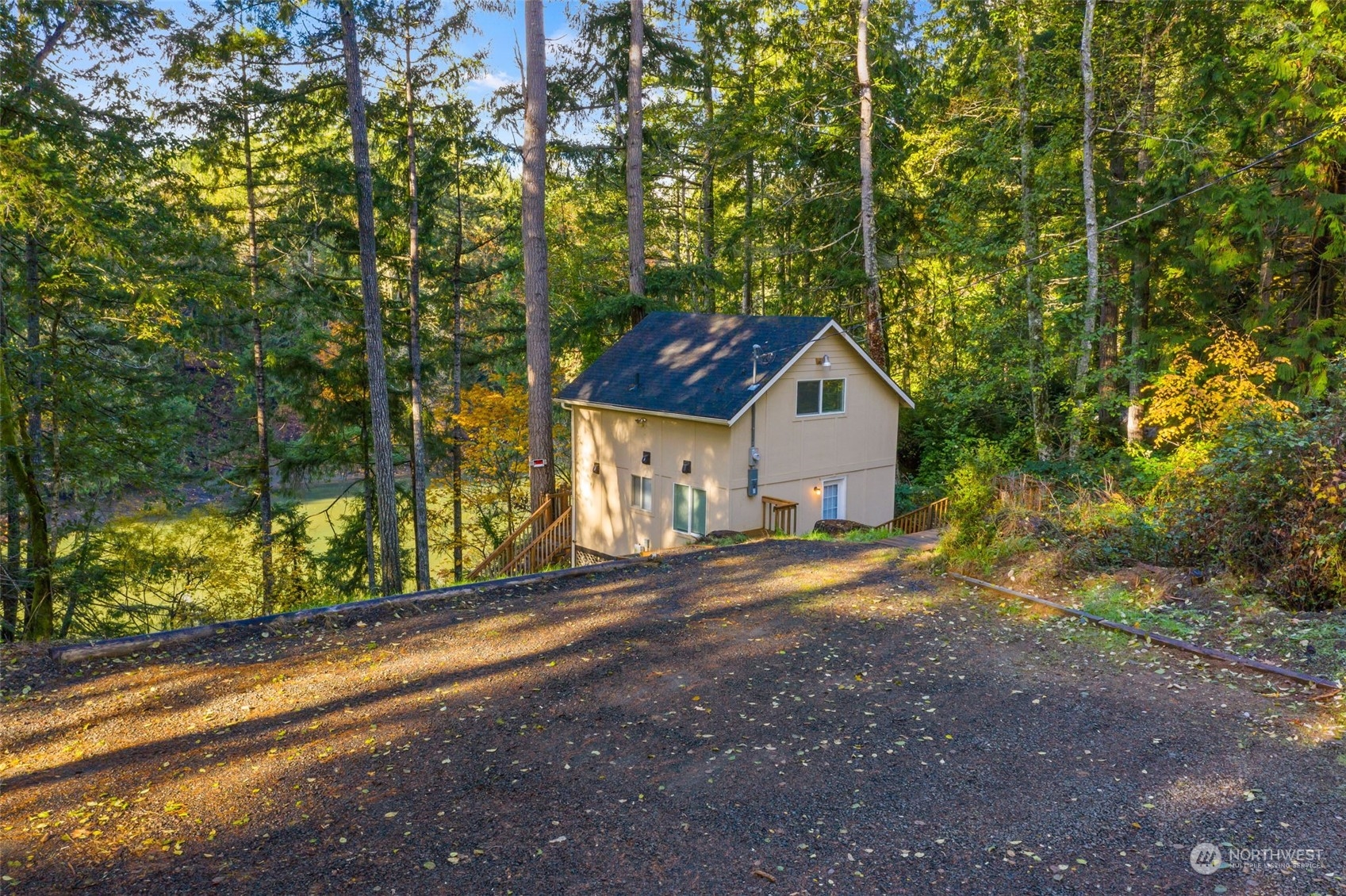 a house with a tree in front of it