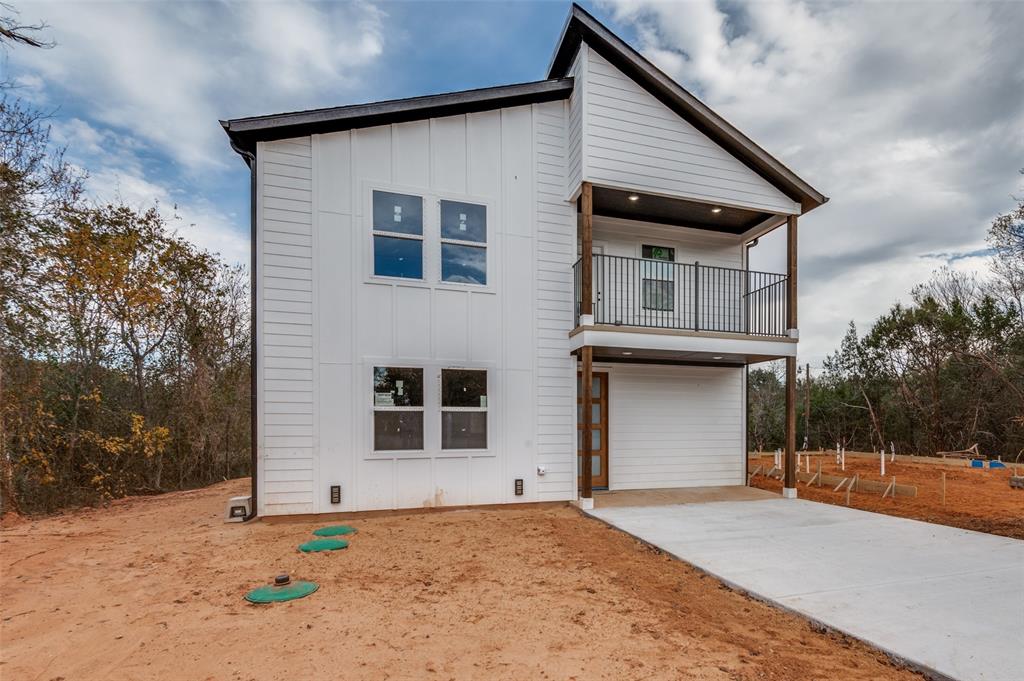 a front view of a house with a garage