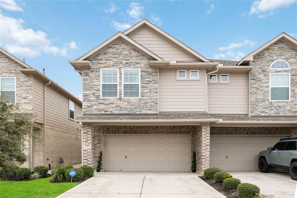 a view of a house with a parking space