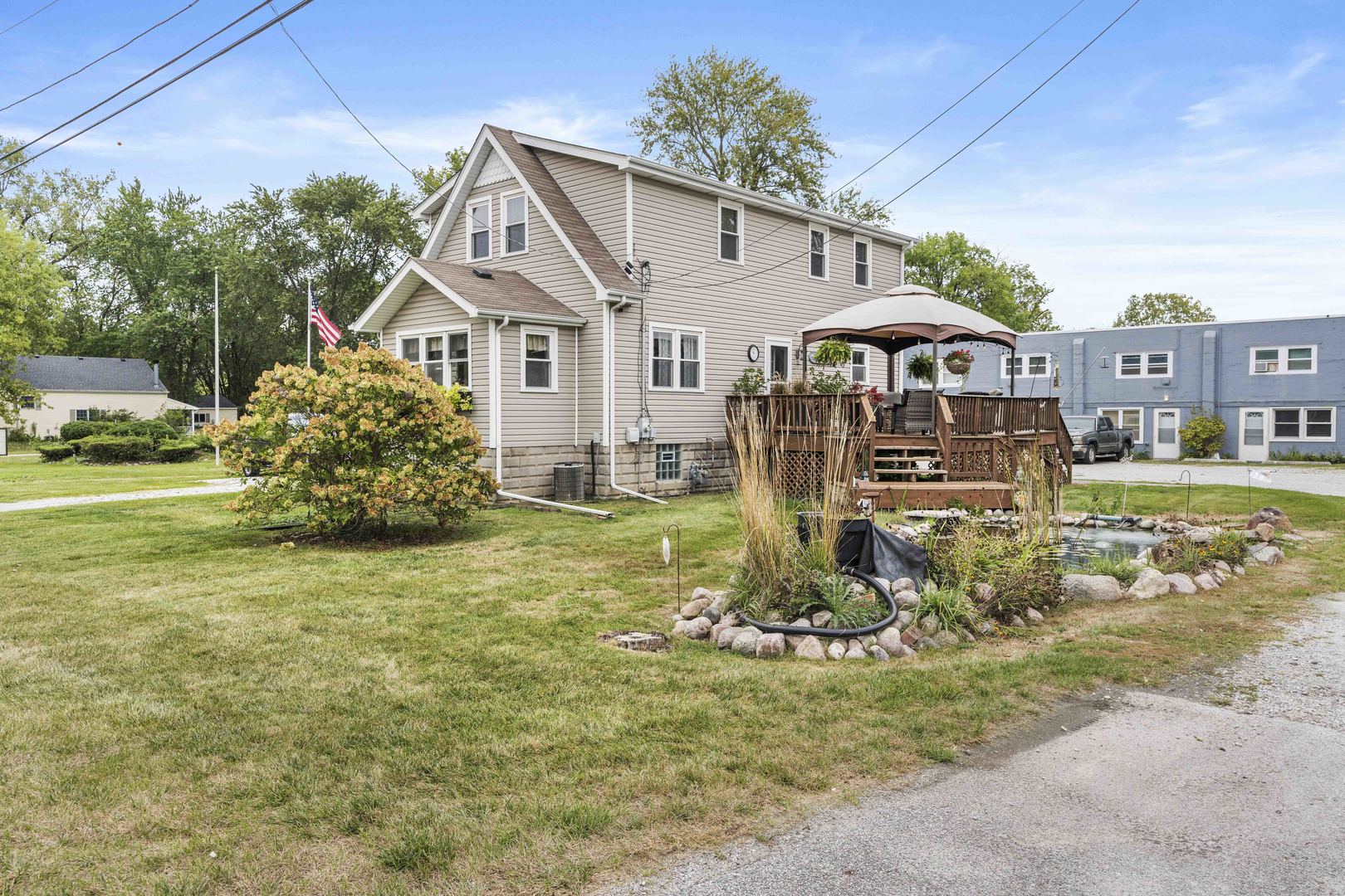 a front view of a house with garden