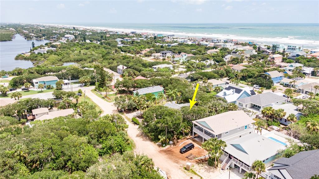 an aerial view of residential building with parking space