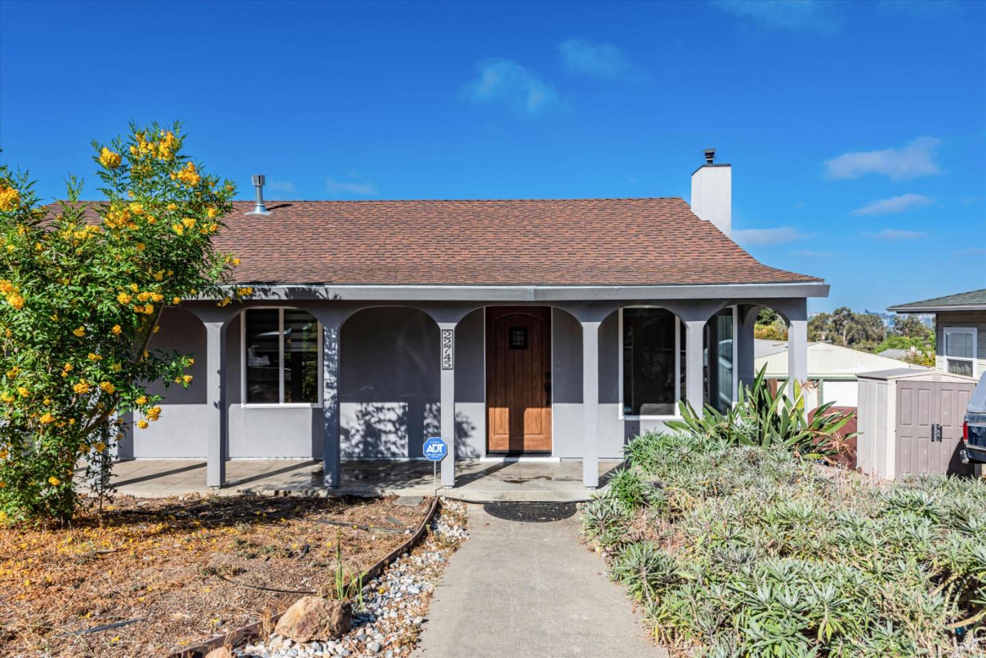 a front view of a house with a porch