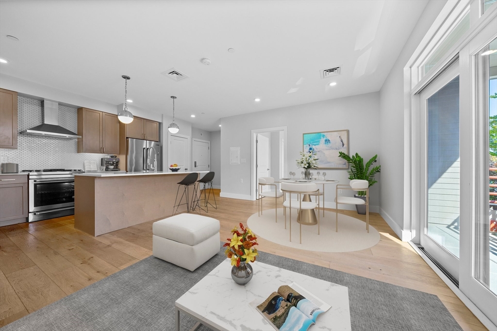 a living room with furniture and a table