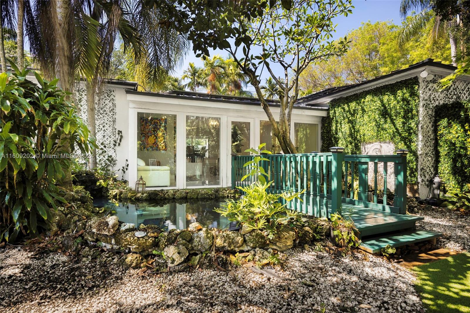 front view of a house with a garden