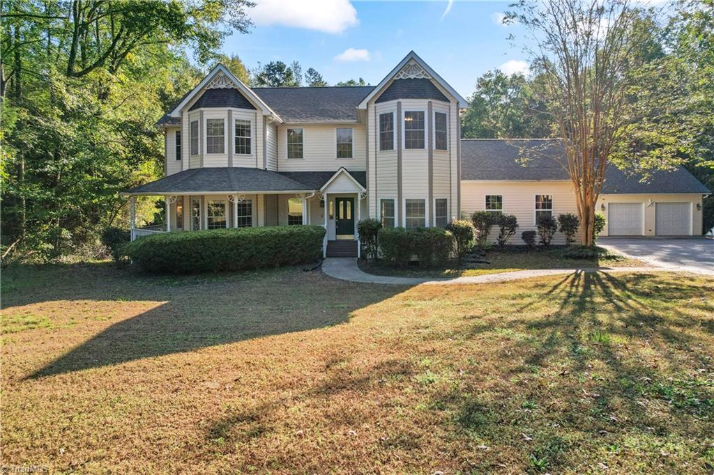 Welcome to this stunning 4 bedroom Victorian style home at 2720 Lentz Road, China Grove