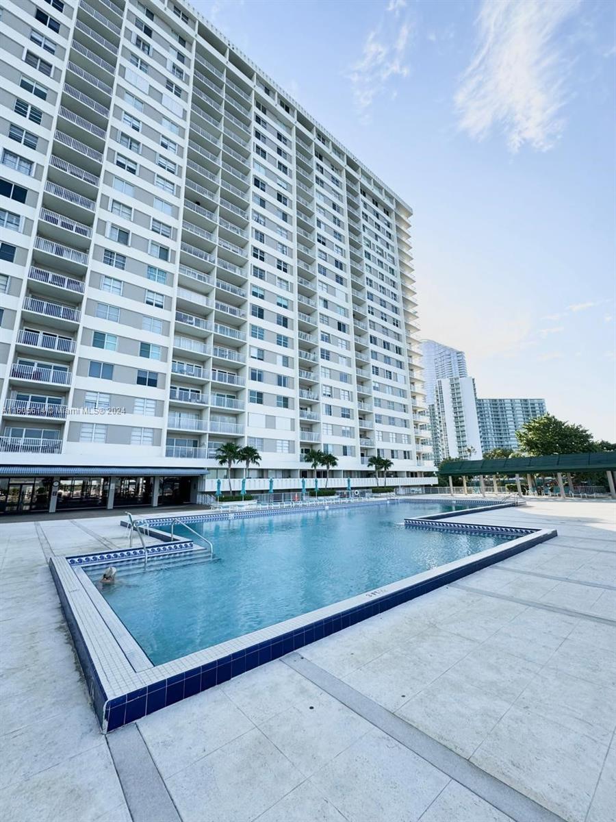 a view of a swimming pool and outdoor space