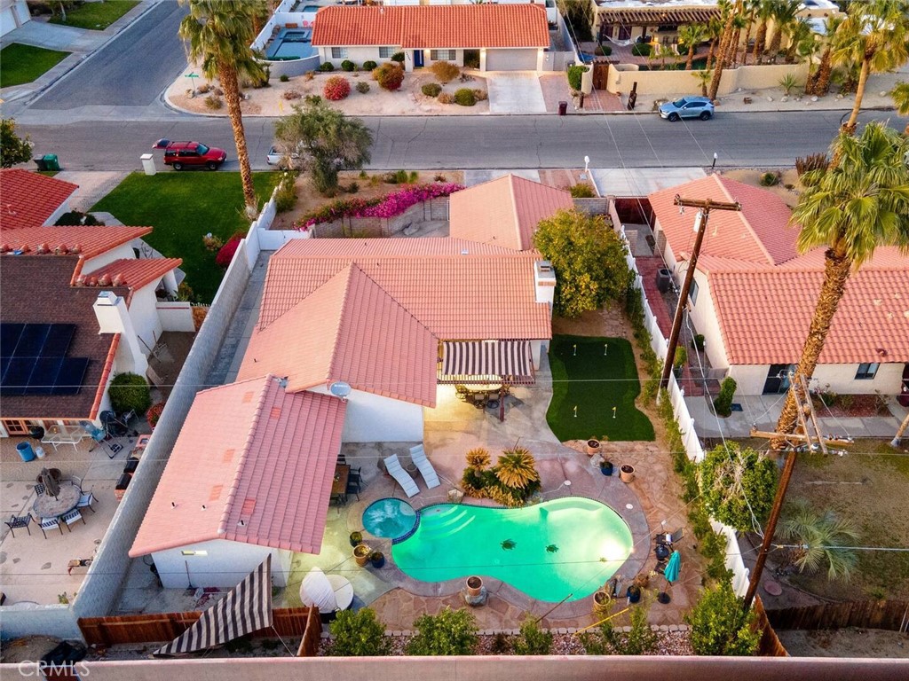 an aerial view of houses and outdoor space