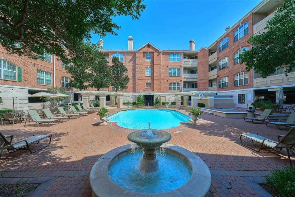 a swimming pool with outdoor seating