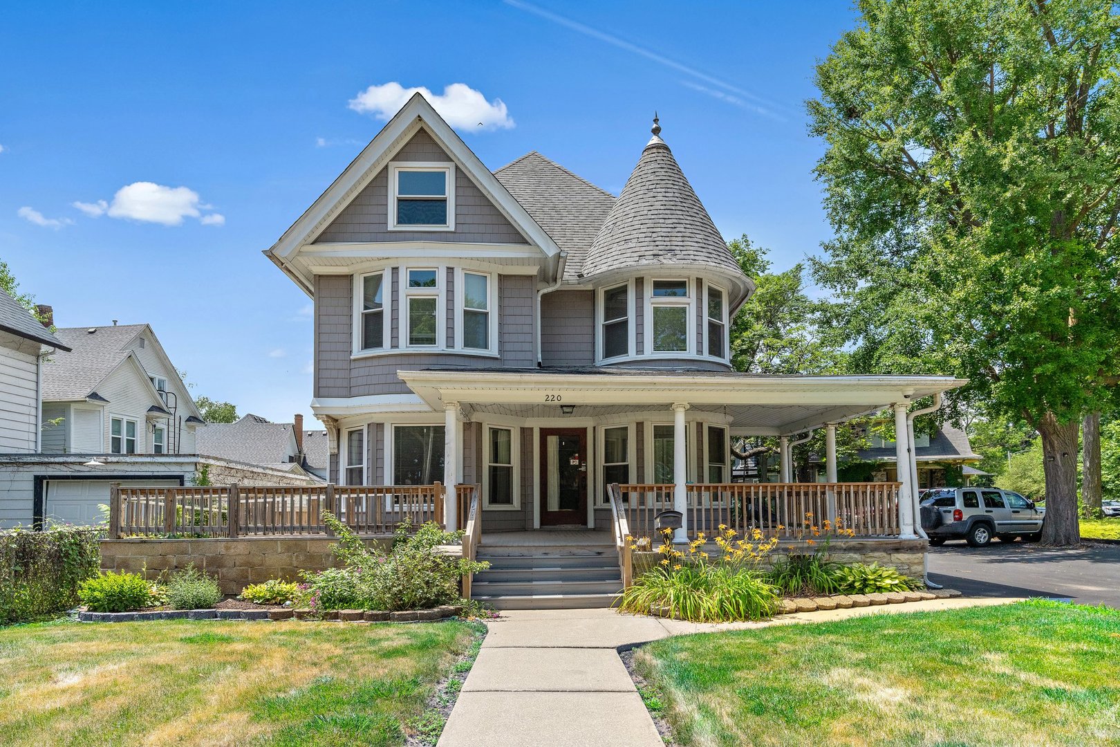 front view of a house with a yard