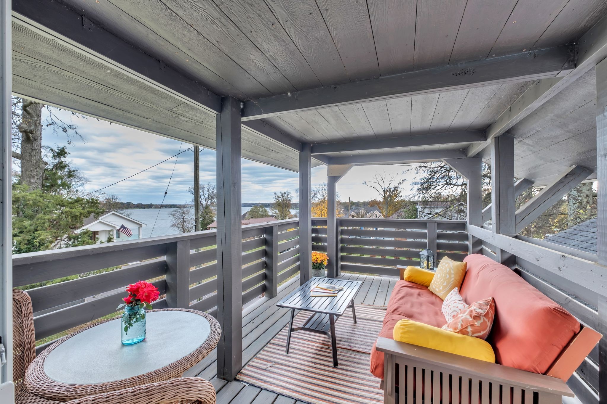 Rain or shine this covered deck is right off the primary bedroom.