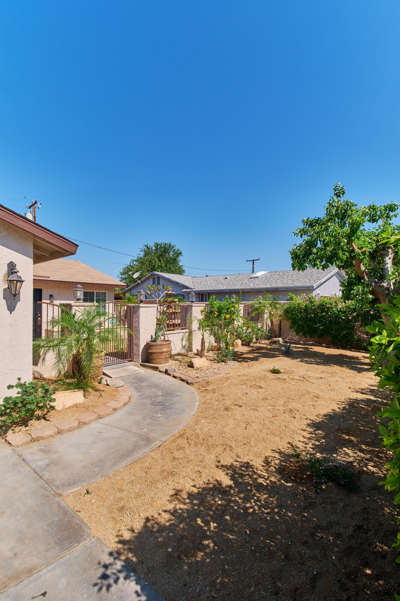 a view of a backyard of a house