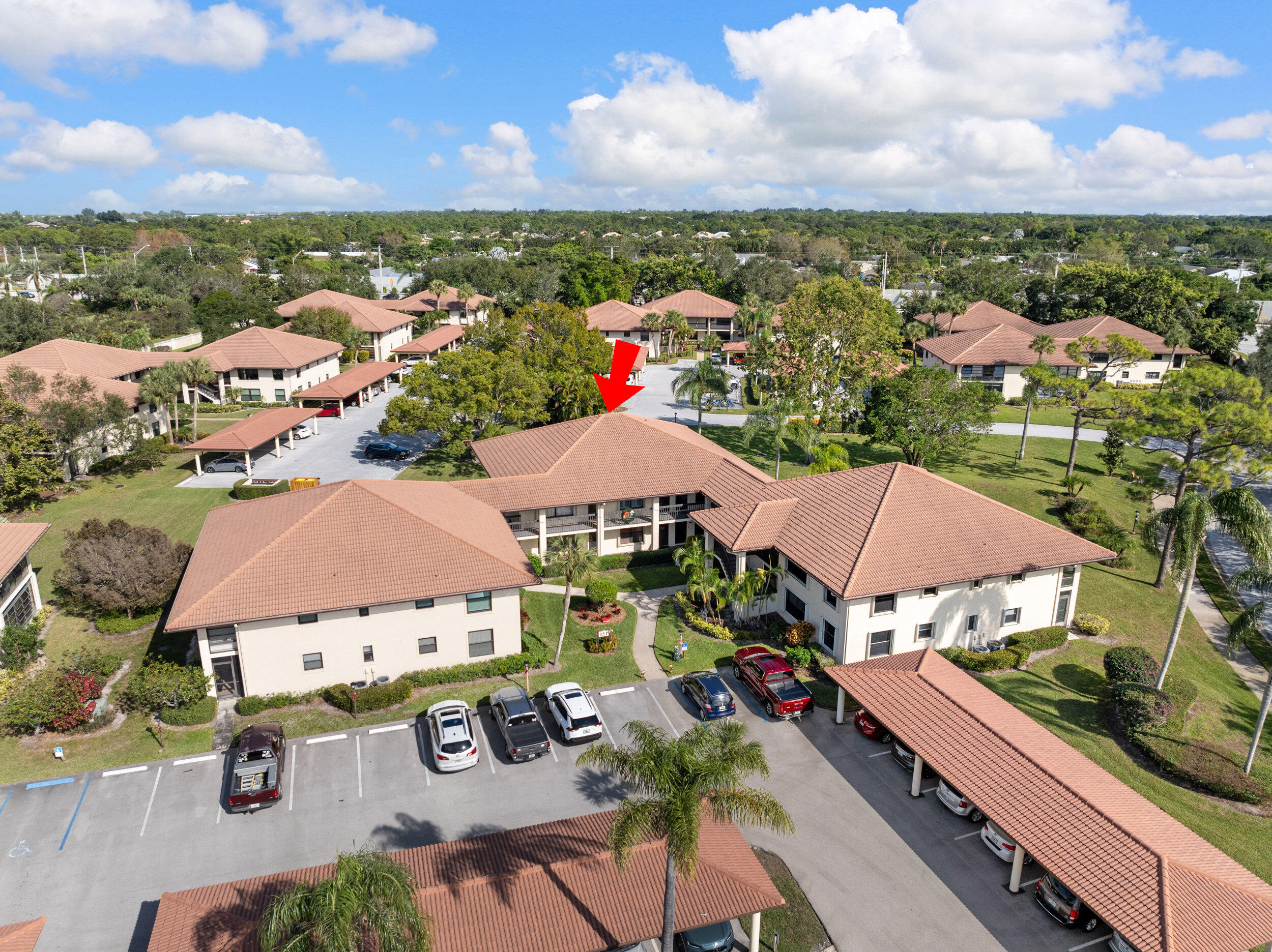 an aerial view of residential houses and outdoor space